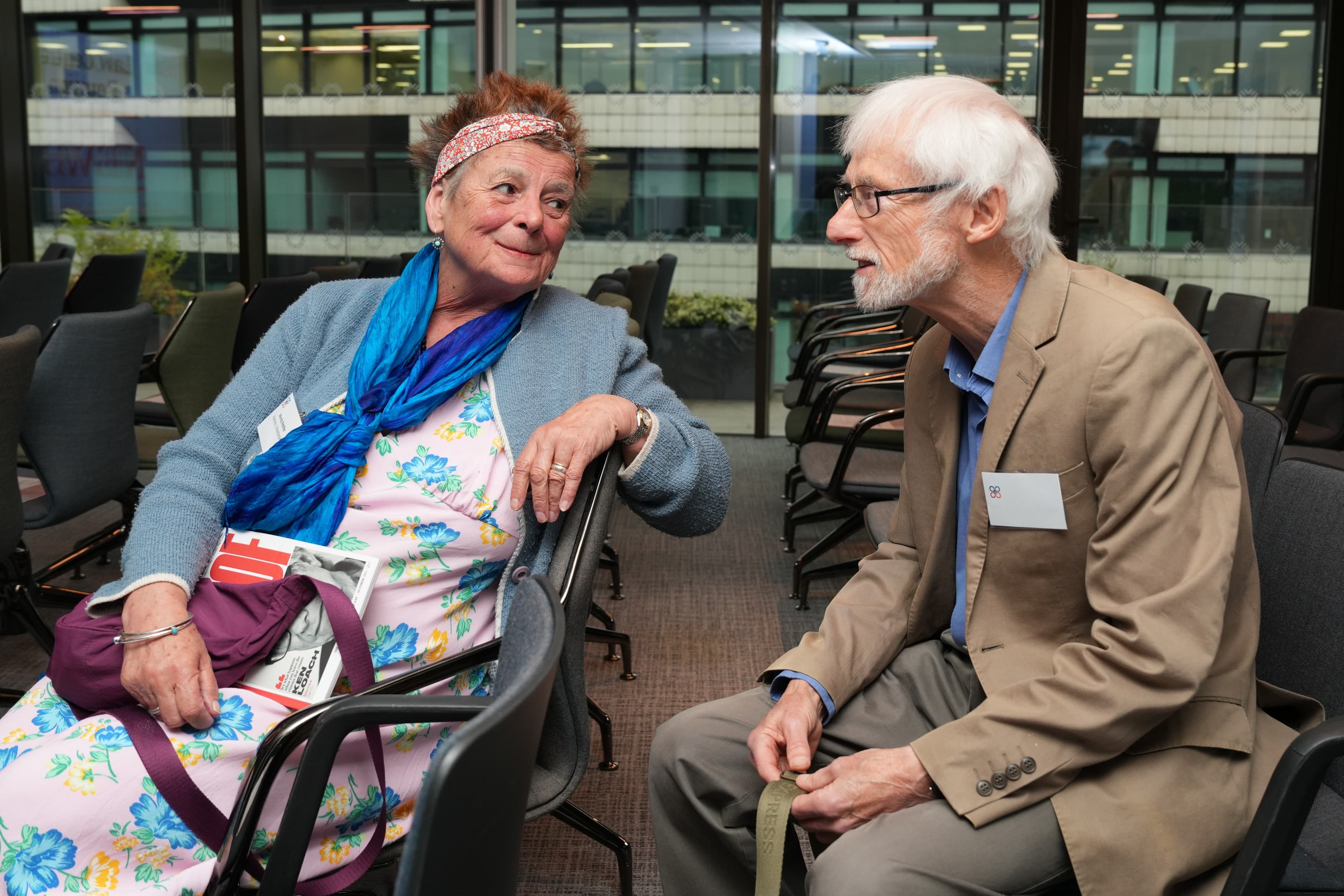 Wendy Pettifer (L) in conversation with a former colleague at a Law Centres reunion event in 2024.